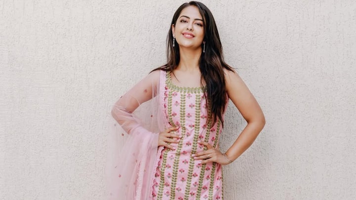 Avika looks elegant in this baby-pink sharara suit that is set with floral thread and gold zari work. With teardrop earrings and a minimal dupatta, the look combines subtle charm with festive poise. (Image Source: Instagram/ avikagor)