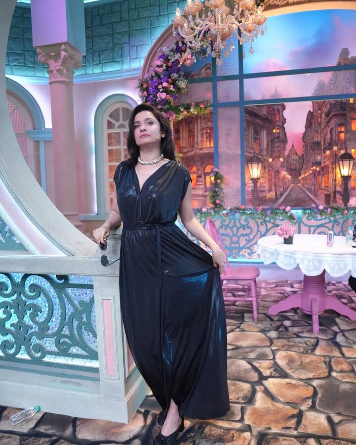 Ankita kept the styling minimal yet impactful to let the dress take center stage. Her hair was styled open, cascading elegantly over her shoulders, lending a touch of old-school glam.