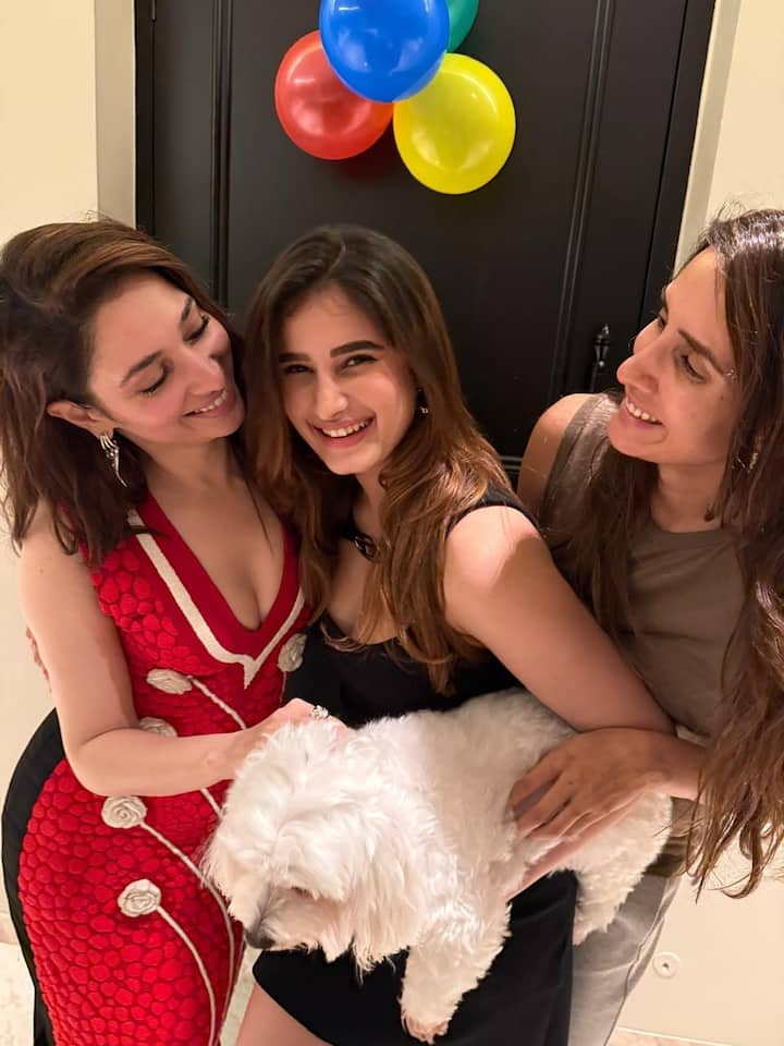 In one of the photos shared on Instagram, Tamannaah’s pet dog Pebbles adorably joined her.
