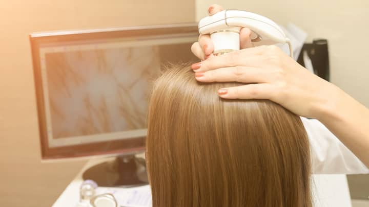 2. Fungal Scalp Infections Spike In Rainy Weather: Wet and sweaty scalp becomes a breeding ground for fungal infections like dandruff and seborrheic dermatitis. These scalp conditions can damage the follicles which leads to itchy, flaky skin, and hair fall. If untreated, the infection can spread and worsen during monsoon. (Image Source: Canva)