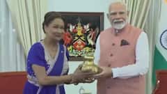 PM Modi Gifts Sacred Water From Maha Kumbh And Ram Mandir Replica To Trinidad PM During His Historic Visit