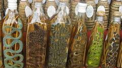 इंसान के कटे अंगूठे से जिंदा सांप मिलाने तक, बेहद अजीब हैं ये शराब, नाम सुनते ही होगा डर का एहसास