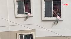 Watch: बिल्डिंग की खिड़की पर लटक गई 4 साल की मासूम, फायर फाइटर ने बचाई जान, देखिए वीडियो