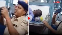 ट्रेन में सो रहे शख्स की जेब से पुलिस ने चुराया फोन, आसपास खड़े देखते रहे लोग- वीडियो वायरल