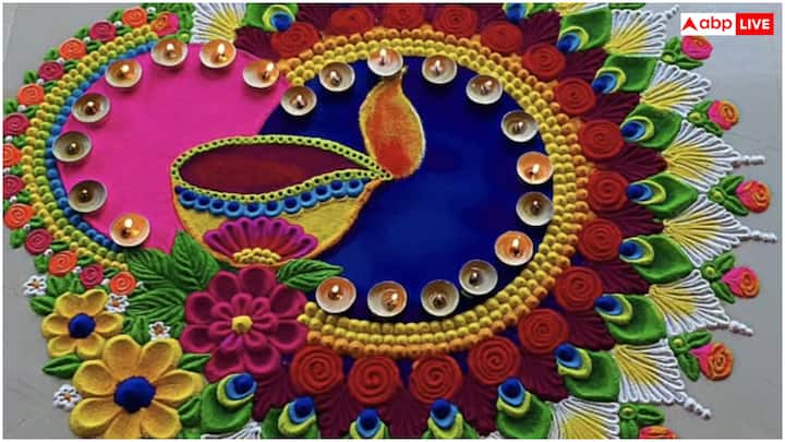 आप गुरु पूर्णिमा पर ओम और कमल का डिजाइन बना सकते हैं. इसके लिए पीले या सफेद रंग से बड़ा ओम प्रतीक बनाएं. इसके चारों तरफ गुलाबी या सफेद रंग से कमल की पंखुड़ियां बनाएं. रंगोली के किनारों पर ज्यामितीय पैटर्न या पत्तियों की आकृतियां बनाएं.