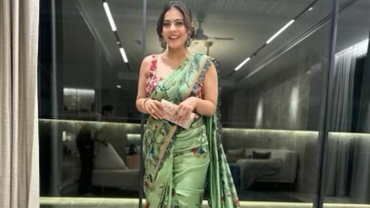 Embracing contrast, Kajol was dressed in a green floral saree with a sleeveless red blouse. This colourful and celebratory outfit perfectly embodies the Hariyali Teej spirit. (Image Source: Instagram/ kajol)