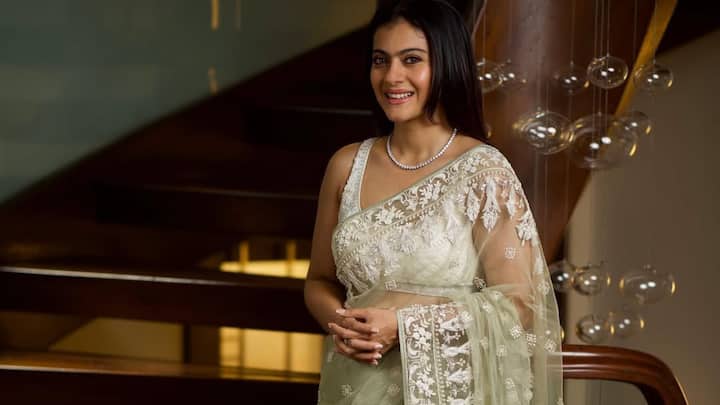 Kajol looked elegant in this pista green net saree embellished with subtle white embroidery. She accompanied it with a diamond choker and light makeup, creating this ethereal appearance apt for a peaceful Hariyali Teej celebration. (Image Source: Instagram/ kajol)