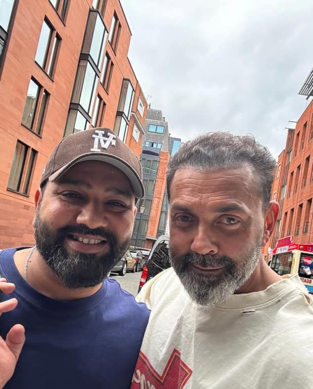 Bobby himself shared a photo with Rohit on his Instagram. It can be seen in the photo, Rohit is wearing a blue T-shirt with the cap. At the same time, Bobby is wearing an off white color T-shirt.