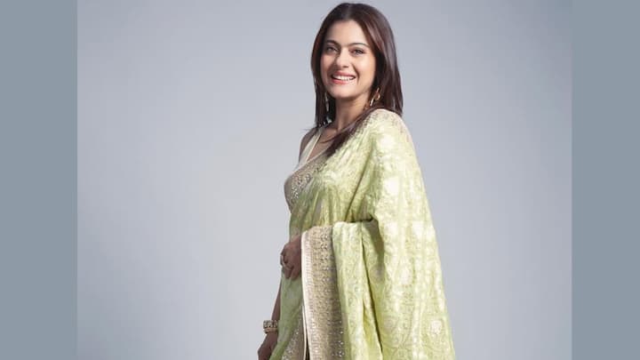 Going for age-old tradition, Kajol chose to wear this lime green Benarasi saree with signature gota patti work. The sleeveless knotted blouse provided a contemporary twist to this otherwise traditional Teej outfit. (Image Source: Instagram/ anitadongre)