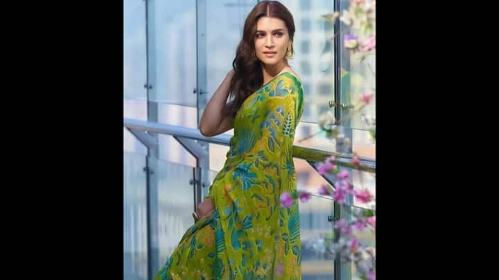 3. Leafy Green Saree: For a festival that celebrates nature and femininity, Kriti Sanon’s lush green saree couldn’t be more perfect for Hariyali Teej 2025. Drenched in a vibrant lime base with tropical leaf motifs and whimsical florals, this breezy georgette saree evoked the essence of monsoon romance. The fuss-free and lightweight saree radiated effortless beauty. The saree served a balanced look with bold prints and grounded tradition. This outfit is a must-have inspiration for women who want to honour festive customs while embracing modern freshness. (Image Source: Pinterest/zenkarami)