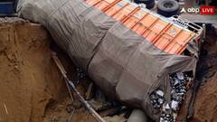 गुरुग्राम में गड्ढे में समाया शराब से भरा ट्रक, लोगों ने पूछा- भाई कौन सी ब्रांड थी?