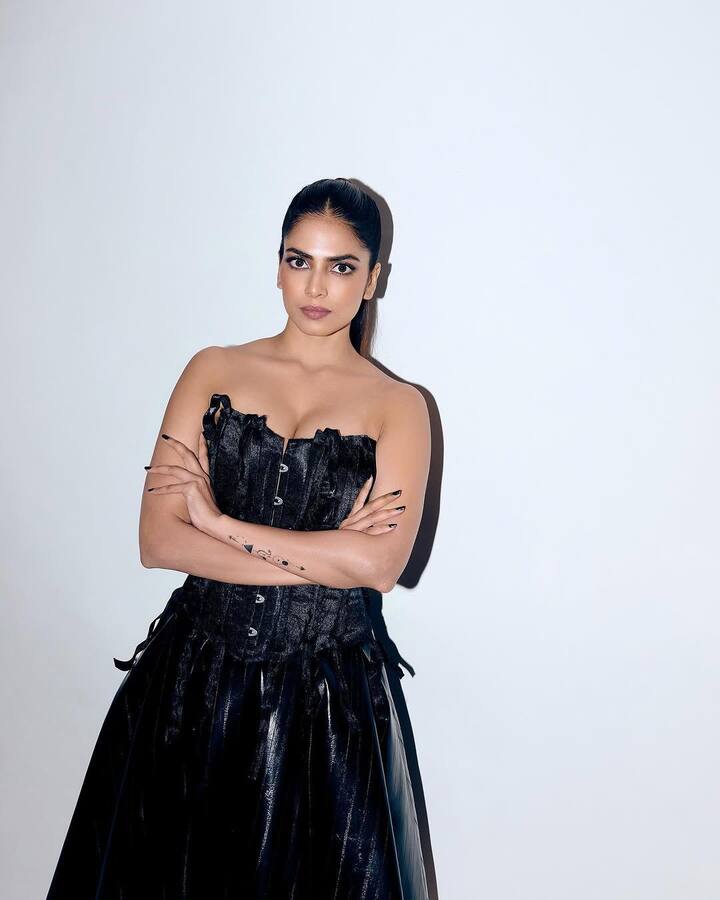 Leather, Attitude, and Runway Rebellion: Edgy and unapologetic, Malavika rocked a sleeveless black leather corset dress with matching boots and a fierce ponytail. This look screamed high fashion rebellion — daring, dynamic, and full of attitude.