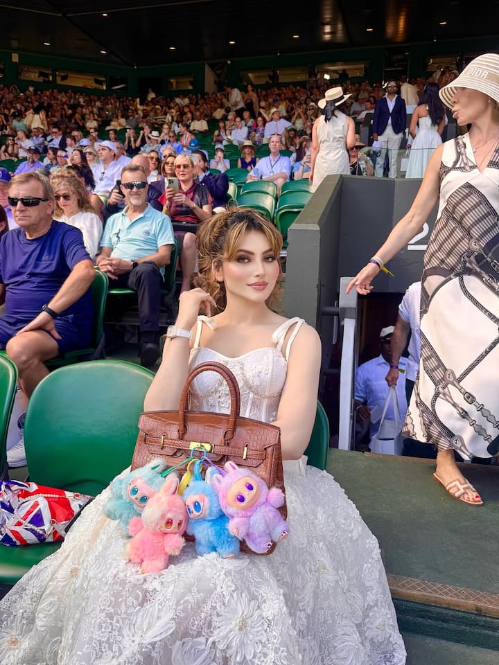 A plunging neckline and corset-style bodice added a structured finish, enhancing the gown’s refined appeal. Flowing effortlessly from the waist, the dress moved gracefully, giving Urvashi the aura of modern-day royalty.