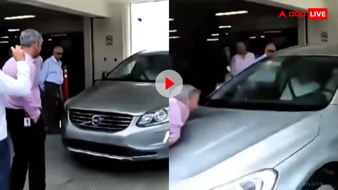 a man who was checking the auto braking system was hit by car video goes viral ऑटोमैटिक ब्रेकिंग सिस्टम को टेस्ट करने के लिए खुद कार के सामने खड़ा हुआ शख्स, जोरदार टक्कर का वीडियो वायरल