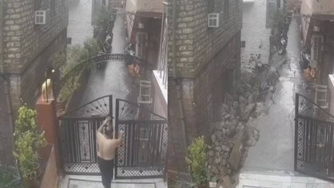 VIRAL News: Terrifying Video Shows Man Escaping Safely As Wall Of Building Collapses During Heavy Rain Viral News: Terrifying Video Shows Man Escaping Safely As Wall Of Building Collapses During Heavy Rain In Rajasthan - WATCH VIRAL News: Terrifying Video Shows Man Escaping Safely As Wall Of Building Collapses During Heavy Rain