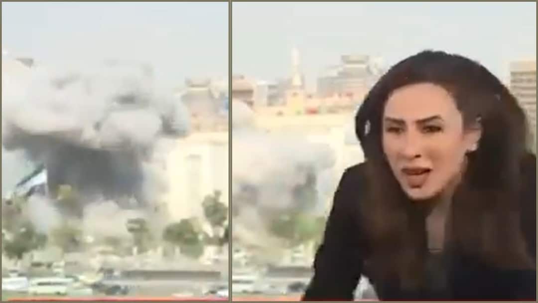 Israel Strikes Syria: சிரியாவை பொளக்கும் இஸ்ரேல்; ராணுவ தலைமையகம் மீது தாக்குதல் - நேரலையில் தெறித்து ஓடிய செய்தி வாசிப்பாளர் Israel Strikes Syria's Military Headquarter Near Government News Studio Anchor Runs as Bomb Struck in the Background Israel Strikes Syria: சிரியாவை பொளக்கும் இஸ்ரேல்; ராணுவ தலைமையகம் மீது தாக்குதல் - நேரலையில் தெறித்து ஓடிய செய்தி வாசிப்பாளர்