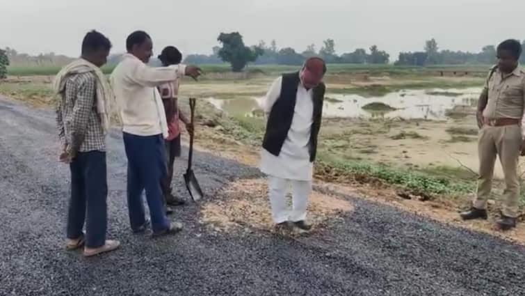 बस्ती में घटिया निर्माण की पोल खुली, सुभासपा विधायक के पैर रगड़ने से ही उखड़ गई सड़क Basti Corruption in road construction uprooted just by rubbing the feet by MLA Dudhram ann बस्ती में घटिया निर्माण की पोल खुली, सुभासपा विधायक के पैर रगड़ने से ही उखड़ गई सड़क