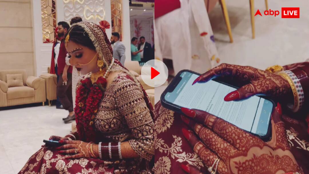 शादी का मंडप बना क्लास रूम! मोबाइल में नोट्स रटती दिखी दुल्हन, वीडियो वायरल Bride was seen studying on her mobile phone while preparing for her exam on the wedding day video goes viral शादी का मंडप बना क्लास रूम! मोबाइल में नोट्स रटती दिखी दुल्हन, वीडियो वायरल