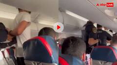 हवा में था प्लेन, पैसेंजर खोलने लगा इमरजेंसी गेट, हलक में आ गई जान; देखें वीडियो