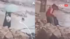 Watch: चलते-चलते पानी से भरे गड्ढे में समा गई महिला, मुश्किल से बची जान, सामने आया CCTV फुटेज