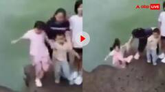 पिकनिक पर फैमिली का चल रहा था फोटो सेशन, तभी बहते पानी में गिर गई छोटी बच्ची; वीडियो देख कांप जाएगी रूह