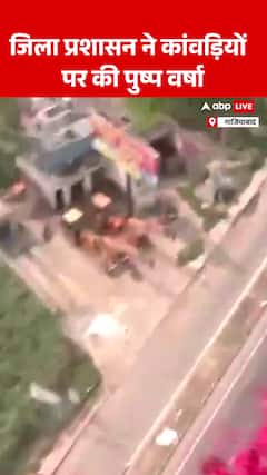 District Administration Warmly Welcomes Kanwariyas with Grand Flower Shower During Kanwar Yatra