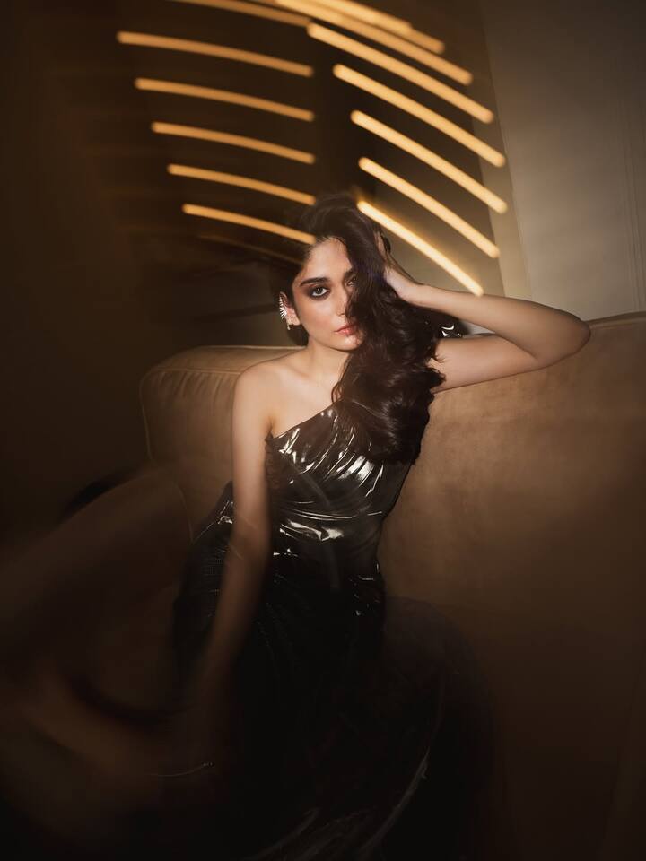 Captured in a moody, cinematic setting, the actress stuns in a sculpted metallic gown that’s both sleek and statement-making.