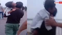 Video: बीमार बेटे को गोद में उठाकर 700 मीटर पैदल चला पिता, प्रशासन ने बंद कर दिया पुल
