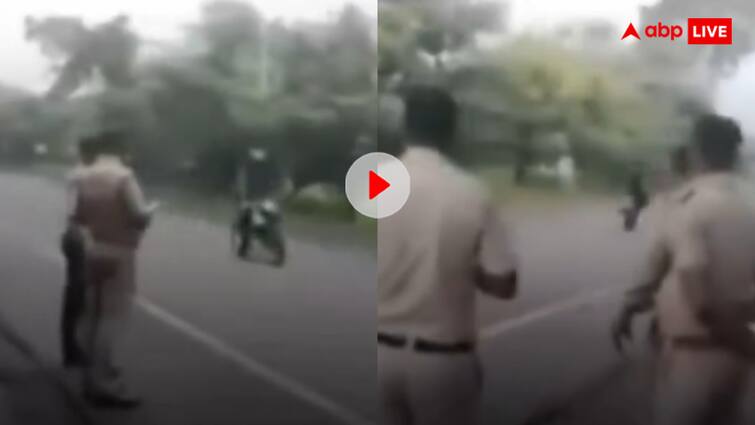 Man Start Stunt in front of Police force after got challan of rupees 2 thousand video goes viral अलग ही ब्रीड है भाई! 2000 का कटा चालान तो पुलिस के सामने ही स्टंट करने लगा शख्स- वीडियो हो रहा वायरल