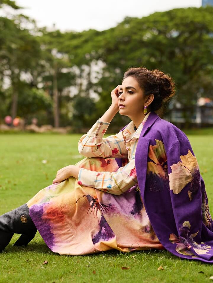 The soft pleats and billowy fabric balance the strong outer layer.