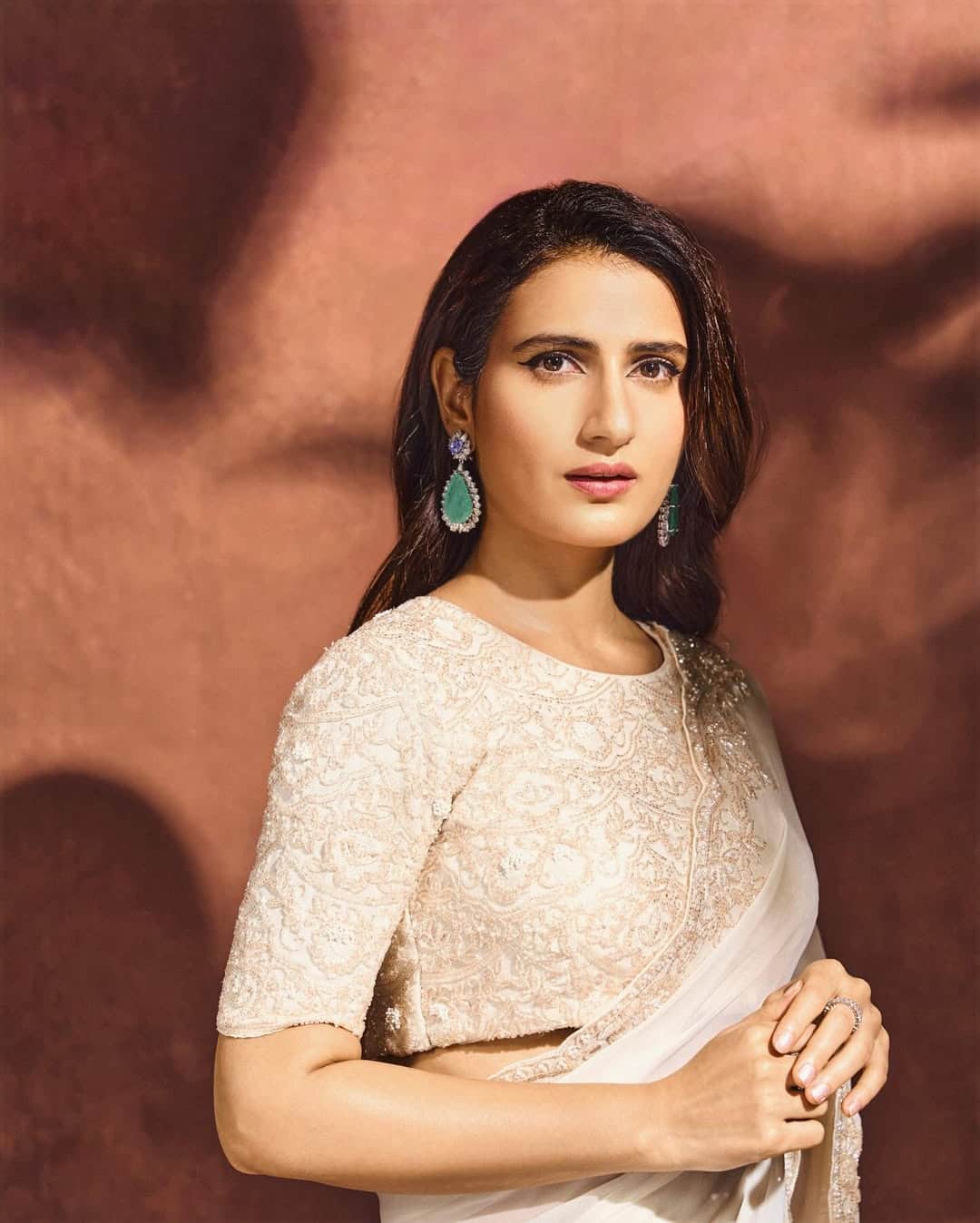 Fatima Sana Sheikh's boat neck blouse design- If you are looking for a simple, elegant and always trendy blouse design, the boat neck blouse is a great option. This design gives a classy look and easily matches with any saree or lehenga.
