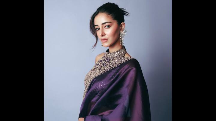 8. Ananya Panday: High-neck blouses with intricate detailing are going to be a big trend this season. Ananya Panday rewrote saree fashion with her statement high-neck blouse. Instead of sticking to the usual deep cuts, Ananya went for a heavily embroidered, halter-style high-neck blouse that exuded class and sophistication. The intricate embroidery on the structured neckline framed her shoulders, giving an elegant and youthful vibe. It’s the perfect inspiration if you are looking for a fusion of contemporary design with a royal Indian aesthetic. (Image Source: Instagram/@ananyapanday)