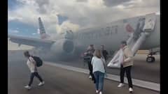 Flight Fire: விமானத்தில் பற்றிய தீ, குபுகுபுவென எழுந்த கரும்புகை - அலறி அடித்து கீழே குதித்து ஓடிய பயணிகள்