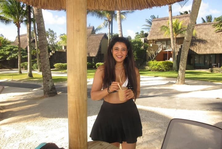 In this look, Shweta Tiwari is wearing a black polka dot bikini top and mini skirt. His look looks cool and stylish in the beach side vacation vibe.