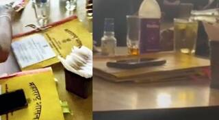 नागपुरातील बीअर बारमध्ये चक्क 'शासन कारभार', रविवारच्या सुट्टीच्या दिवशी दारूचे घोट घेत प्रशासकीय फायलींवर सह्या; व्हिडिओ व्हायरल