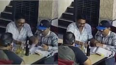 बारमध्ये दारू ढोसत सरकारी फाईलवर सह्या करणारा अधिकारी निलंबित, शासनाचा आदेश