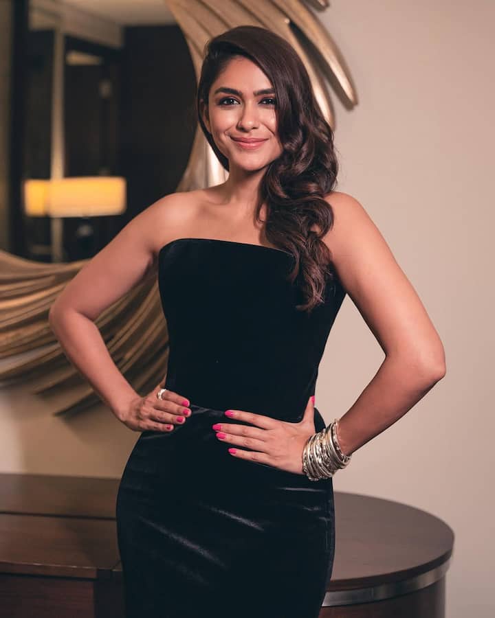 Structured gown: Mrunal Thakur donned a full black structured gown that accentuated her curves.