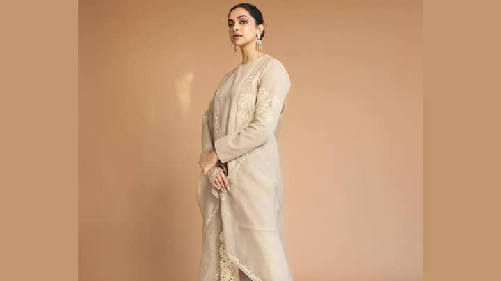 Deepika Padukone wore this beige kurta suit with golden embellishment and subtle floral embroidery. The closed neckline and minimalistic design impart a classic charm for a traditional Raksha Bandhan celebration. (Image Source: Instagram/ deepikapadukone)