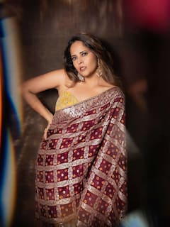 Anasuya Bharadwaj: శారీలో అందాల అనసూయ - పవర్ ఫుల్ వుమెన్... క్యూట్ లుక్స్