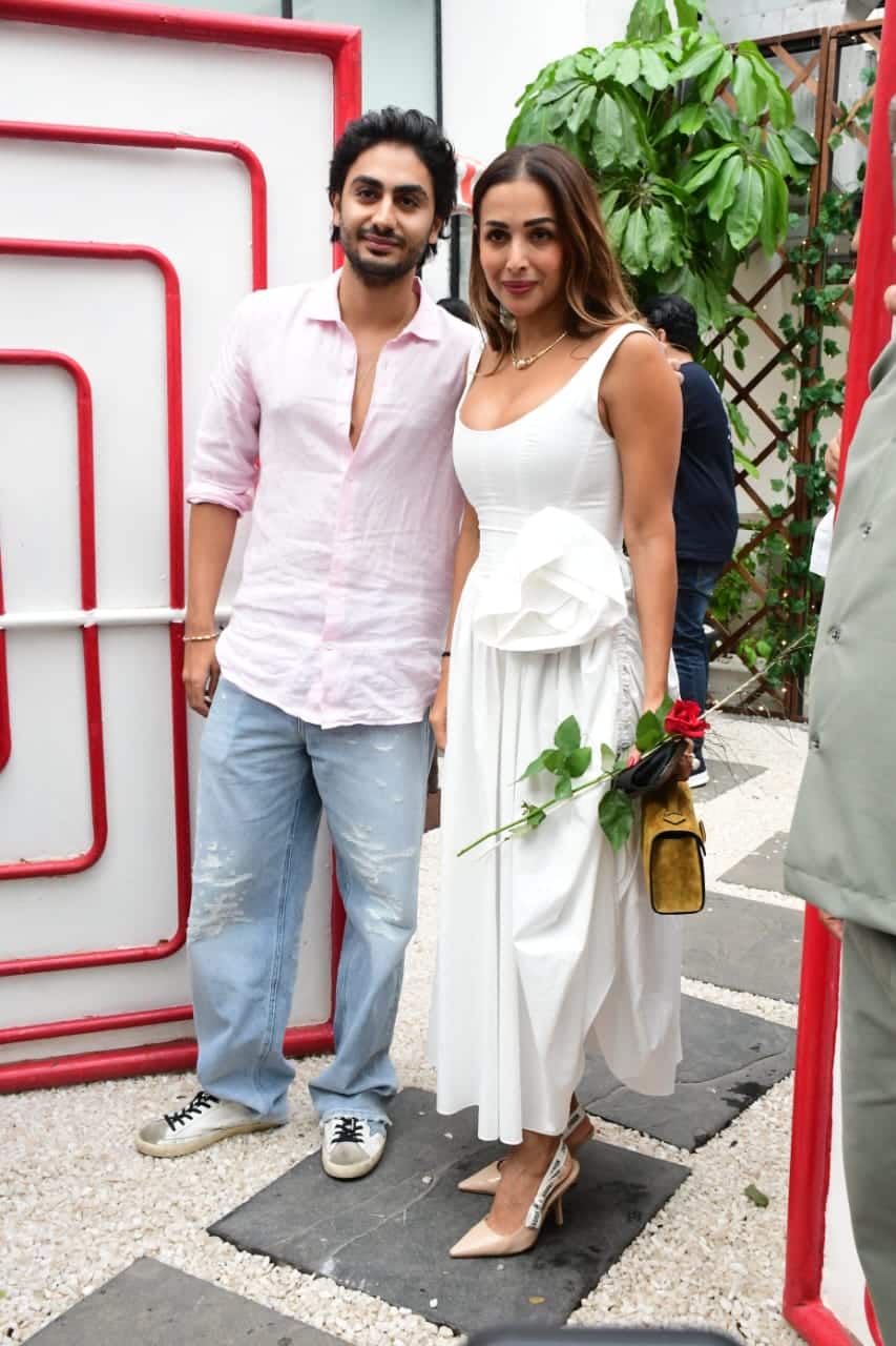 Malaika carried a white look for this outing. The actress is wearing a deepene long dress. In which she looks beautiful like Apsara.