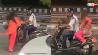 Video: अरे दीदी! नशे में धुत लड़की का ड्रामा, ट्रैफिक पुलिसकर्मी की स्कूटी रोक जबरदस्ती पीछे बैठी