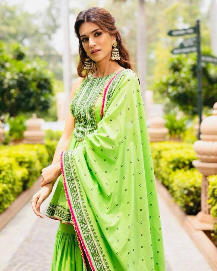 From this green sharara set you make the spotlight your name. The actress carried green sharara here and has taken heavy earrings pair with it. Complete your look with smokey eye makeup and open hair.