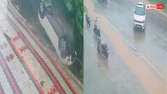 Video: बारिश में सड़क पर फिसली तेज रफ्तार कार, रोहित शेट्टी स्टाइल में पलटी, डरा देगा वीडियो