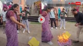 महिला ने शोरूम के सामने फूंक डाली 6 हजार रुपये की ड्रेस- वीडियो देख घूम जाएगा माथा