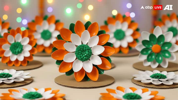 Spoon Flower Decor: Turn the ordinary plastic spoons into vibrant petals by cutting and painting them in saffron, white, and green. Arrange them on cardboard to form a striking tricolour flower. (Image Source: ABP LIVE AI)