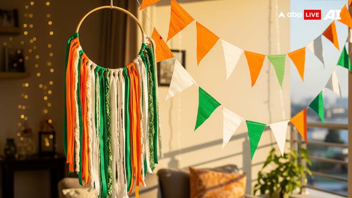 Wall Hangings & Bunting: Cut ribbons or paper strips in the shades of the national flag and tie them to a wooden hoop for a unique wall hanging. Or, string together paper or fabric triangles to create colourful bunting for balconies and living rooms. (Image Source: ABP LIVE AI)