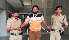 રીબડા ફાયરિંગ કેસ: મુખ્ય આરોપી હાર્દિકસિંહ જાડેજા કેરળથી ઝડપાયો, દોરડાથી બાંધીને અમદાવાદ લવાયો, જુઓ વીડિયો