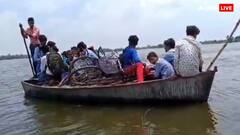 यूपी के बस्ती में भारी बारिश के बाद रौद्र रूप में सरयू नदी, पानी में डूबे गांव, लोगों का जीना दुश्वार