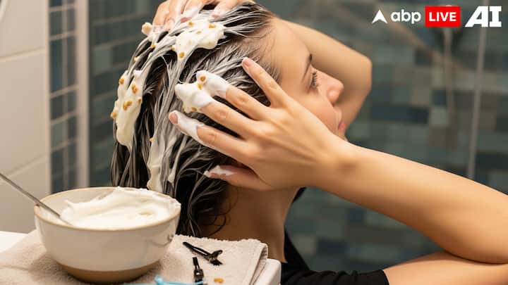7. Yogurt Hair Mask: Yogurt contains natural probiotics that helps in restoring the healthy scalp bacteria. Apply plain yogurt to your scalp to reduce fungal activity. Leave it for 30-40 minutes before rinsing with lukewarm water. Yogurt also helps condition the hair naturally, and reduces dryness and frizz. (Image Source: ABPLIVE AI)