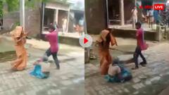 सास को चप्पलों से पीट रही थी बहू! लट्ठ लेकर आया देवर और बीच सड़कर कर दी भाभी की धुलाई- वीडियो वायरल